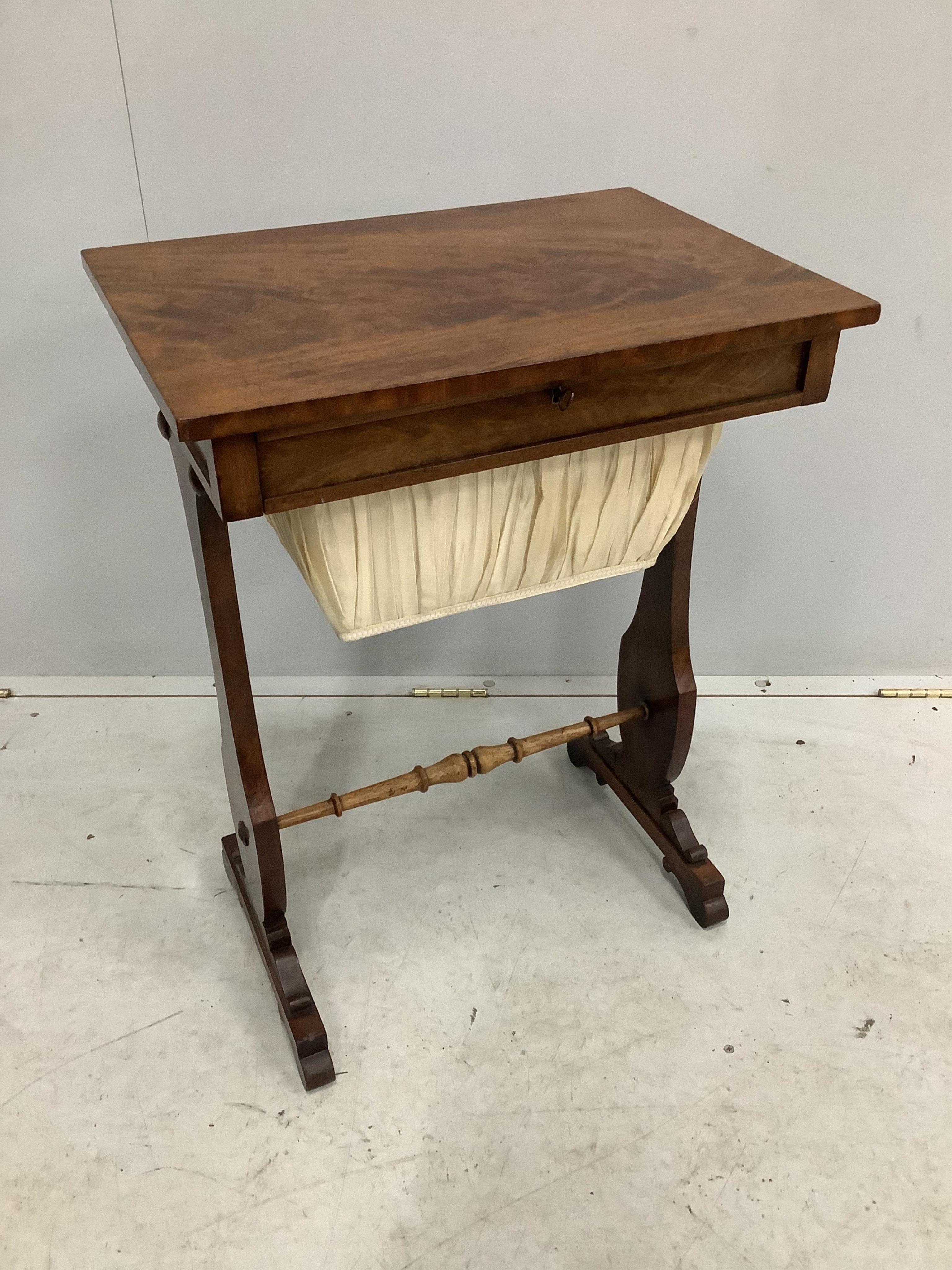 An early Victorian mahogany work table, width 54cm, height 72cm. Condition - good but for rubbing to the stretcher